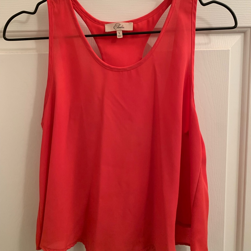 Small, coral tank top.